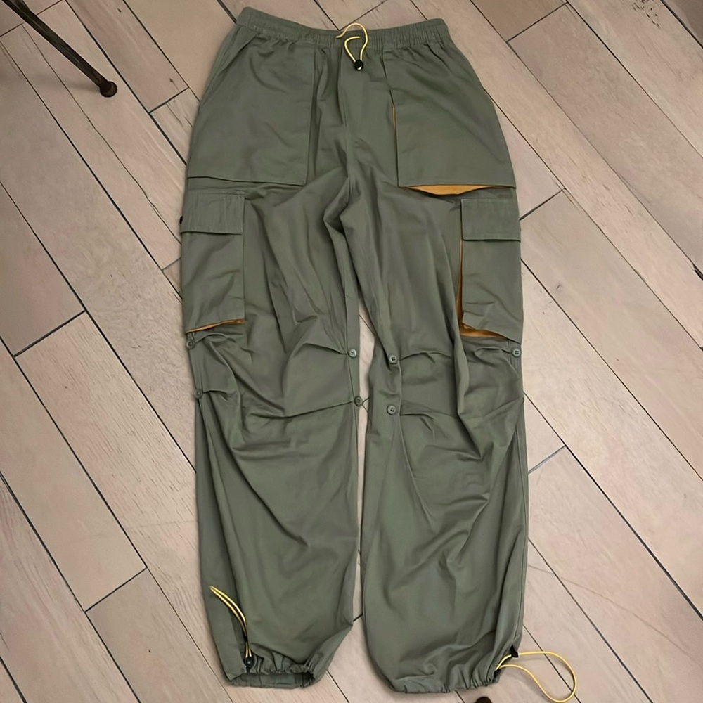 Brain dead parachute cargo pants, yellow accents